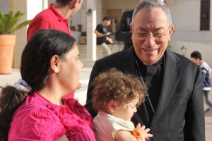 Cardinal Rodriguez meeting Syrian and Iraqi refugees in Jordan in May. Credit: Dana Shahin/Caritas Jordan 