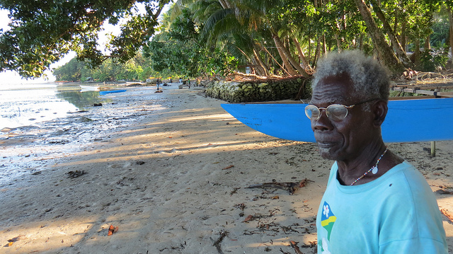  “I hope I die before these islands are covered by the sea.” Eighty-year-old John Sailik was born on the Carteret Islands, a ring of six atolls 50 miles off the coast of Papua New Guinea. Photo by Nicholson/Caritas