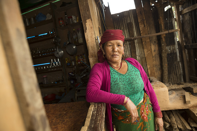 Kumari Gurung (54) is a beneficiary of CRS' Market Recovery Program in Hansapur VDC, Gorkha District, Nepal. CRS helped clear away her destroyed hotel and will provide additional support for her business in the future. Photo by Matthieu Alexandre/Caritas