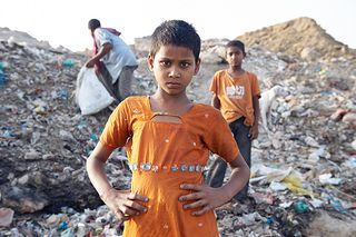 Children living off the rubbish heaps in the slums of India. Andreas Schwaiger/Caritas Switzerland.