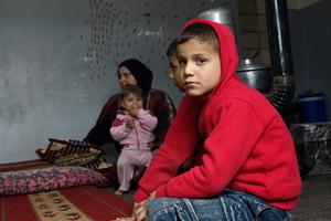 Syrian refugee family being hosted by local Lebanese in Wadi Khaled; northern Lebanon. Credits: Patrick Nicholson/Caritas