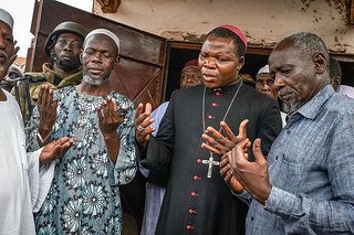 Archbishop Dieudonné Nzapalainga of Bangui joins Muslims in prayer for an end to the crisis in the Central African Republic. Credit: Sam Phelps for Catholic Relief Services.