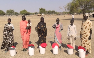 Caritas has been providing basic aid kits to these women displaced by the recent fighting in South Sudan. Credit: Caritas