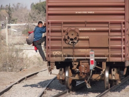 Thousands of people died trying to cross illeagally from Mexico into the US by riding on freight trains. Photo by Ryan Worms for Caritas