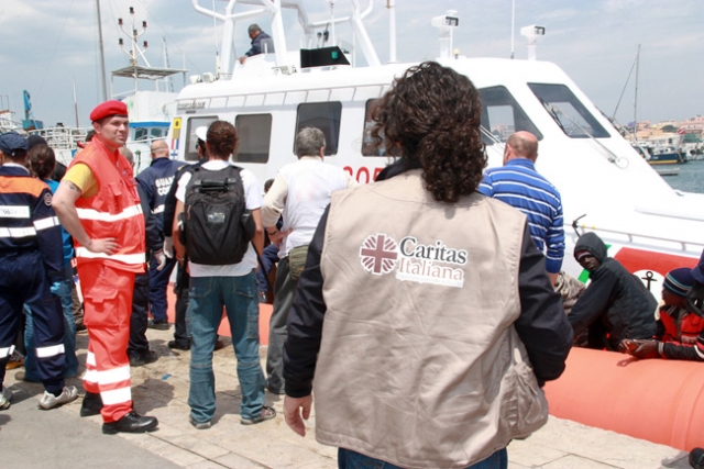 Caritas in Lampedusa provides help to the newly arrived migrants. Credit: Caritas