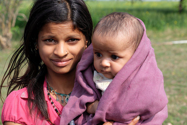 Mother and child in a village outside of Bhopal in the Indian state of Madhya Pradesh. Caritas helps famlies earn a living. 