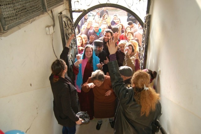 Released after a year held hostage by ISIS, Caroline Hazkour’s family comes home. Credit: Caritas Syria