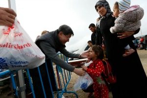 Le  Cardinal Tagle exhorte a la solidarite envers les refugies apres sa visite en Grèce