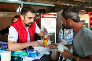 Refugees get aid as they pass through Serbia