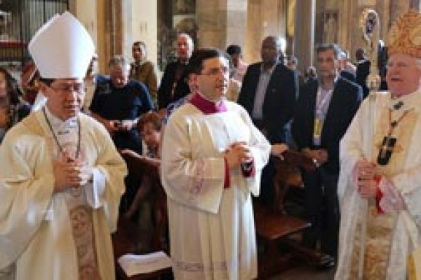 Cardinal Tagle celebrates his first Mass with Caritas