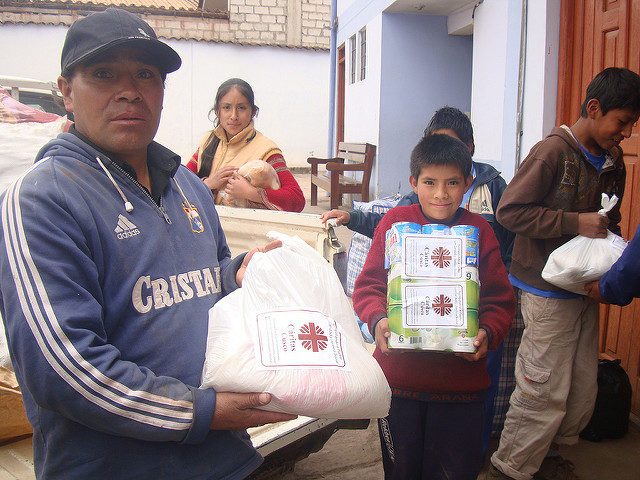 Caritas distributing aid in flood affected areas in Peru