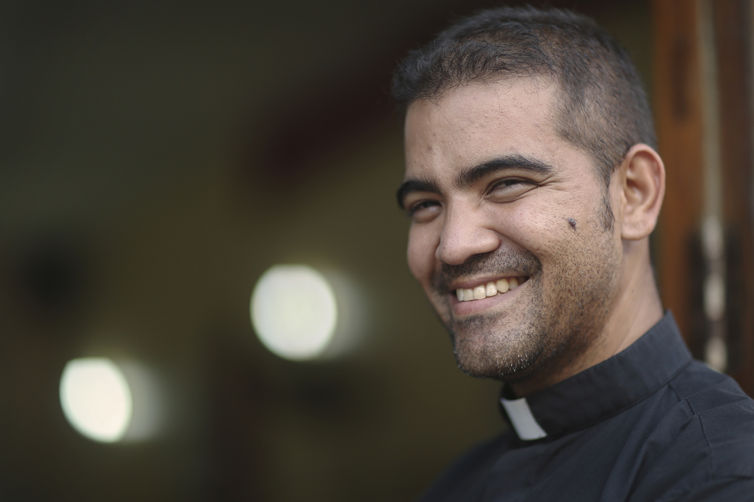 Fr. Alvaro Torres volunteers by providing meals to the community three times a week.
