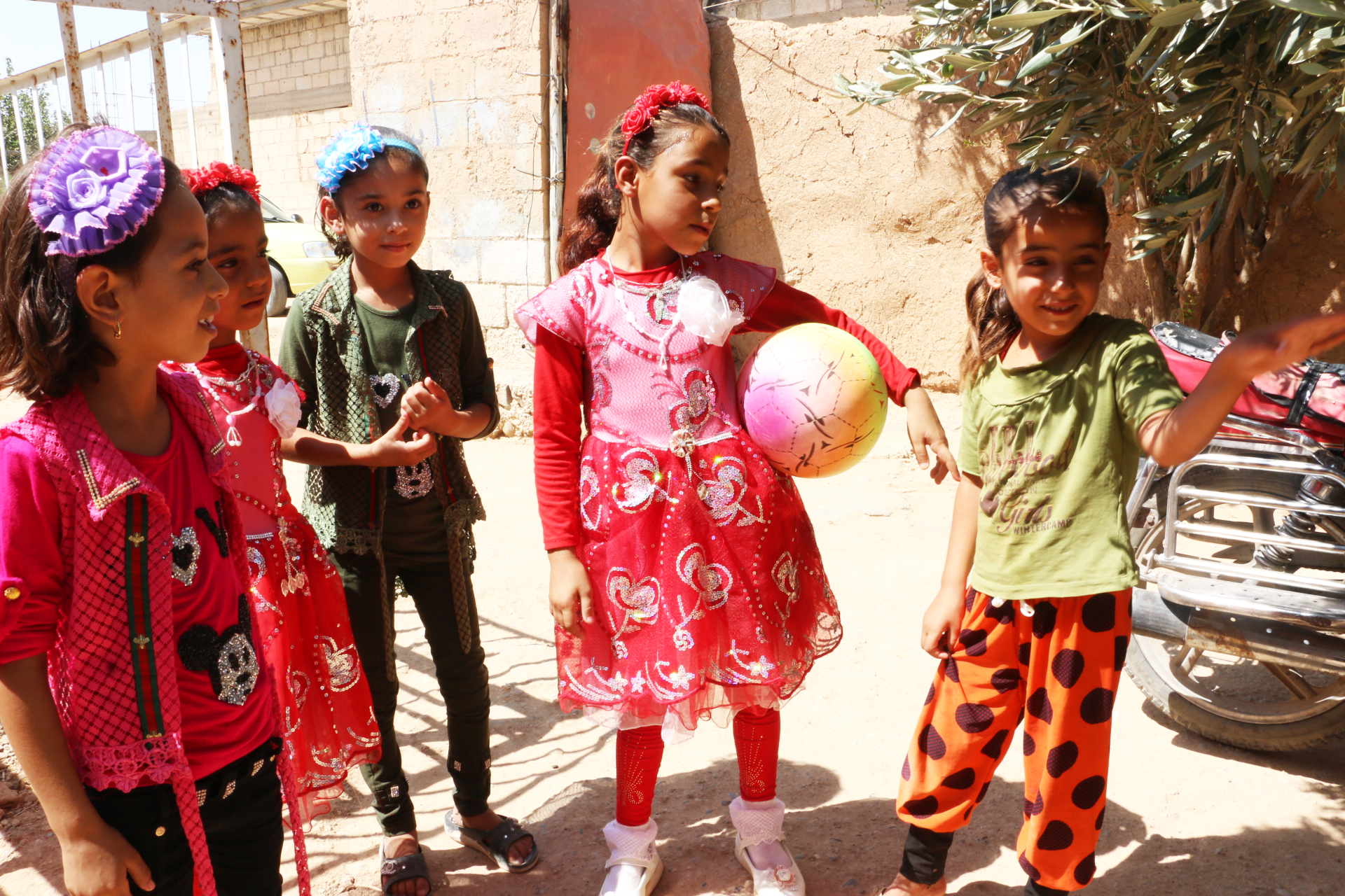 Mohammed's children can play with their friends thanks to help from Caritas Syria