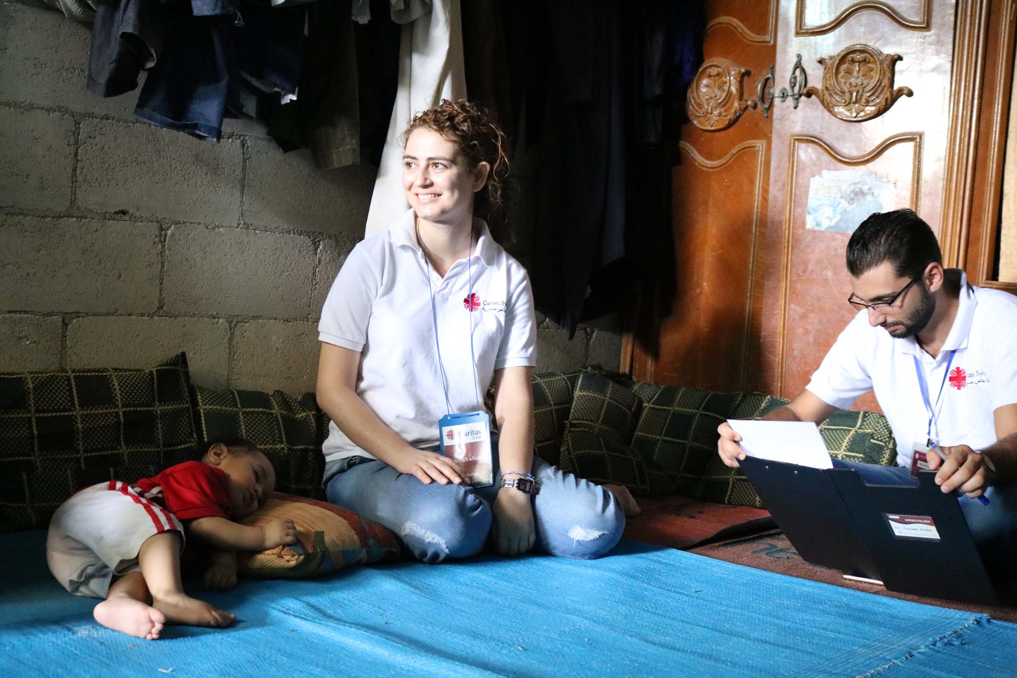 Caritas Syria staff visiting a family in Tartous