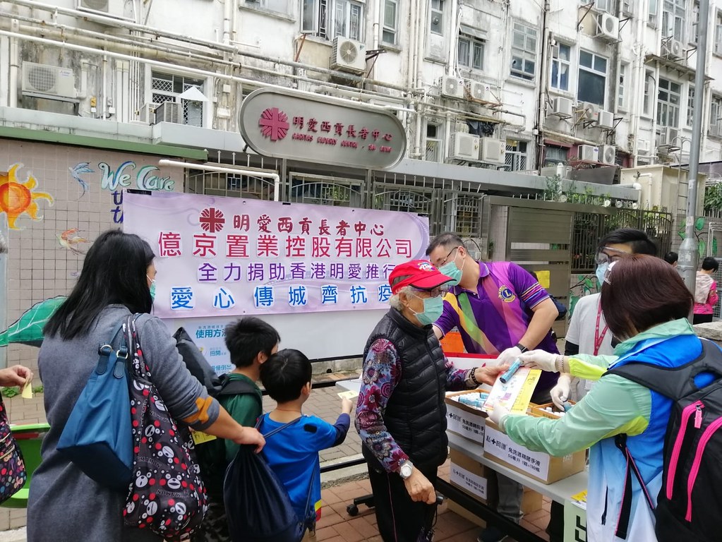 Volunteers and staff of Caritas Hong Kong teach the communities who cannot afford or did not find the source to buy face masks how to sew cloth masks. 