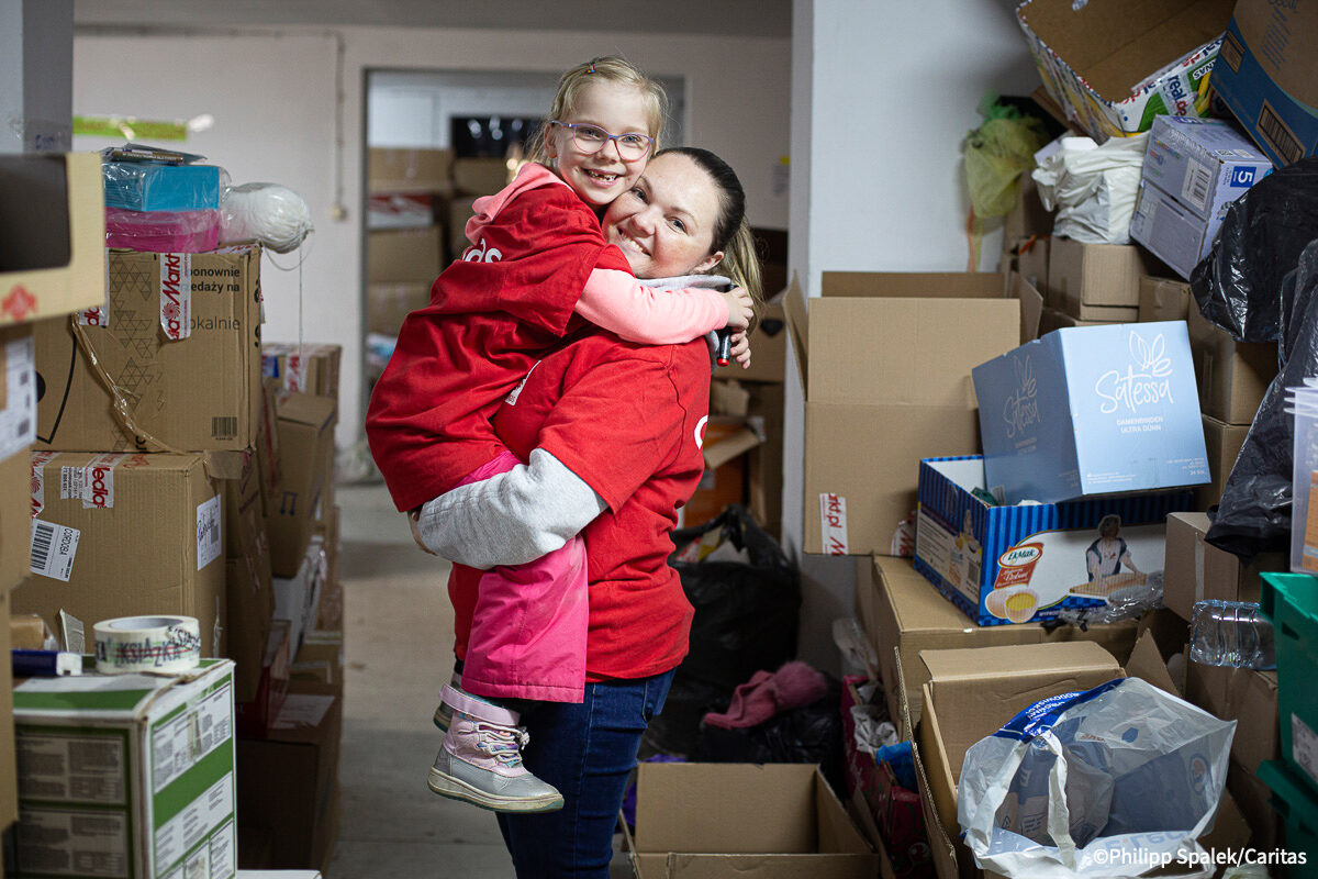 Crisis in Ukraine, mother and daughter from Poland volunteer for Caritas Logistics Center in Lublin